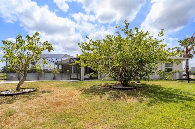 view of yard with a lanai