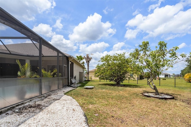 view of yard featuring a lanai