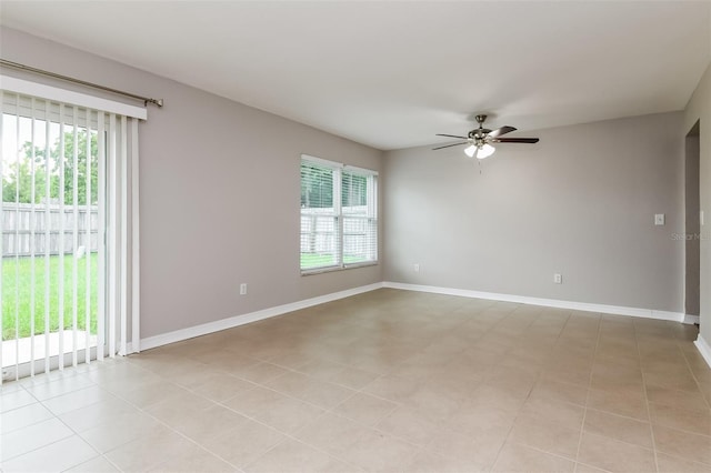 408 S Edgemon Ave, Winter Springs, FL 32708 - empty room with plenty of natural light, a ceiling fan, and baseboards