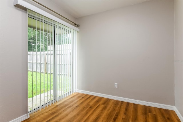 408 S Edgemon Ave, Winter Springs, FL 32708 - unfurnished room featuring baseboards, wood finished floors, and plenty of natural light