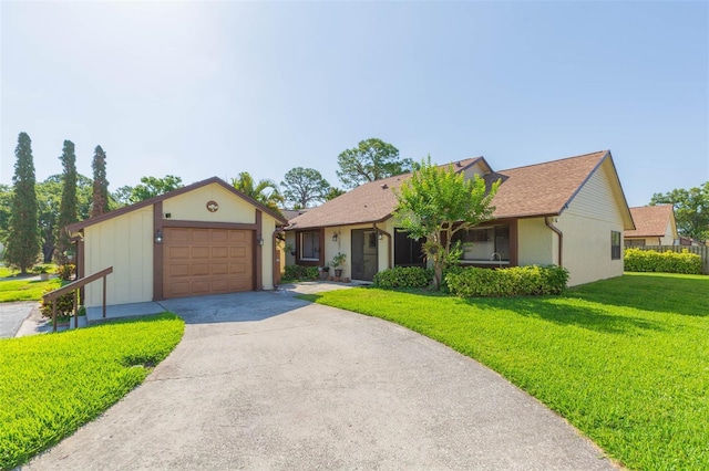 2211 Bay Berry Ln, Clearwater, FL 33763 - ranch-style home featuring a front lawn, an attached garage, and concrete driveway