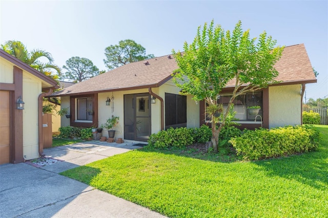 2211 Bay Berry Ln, Clearwater, FL 33763 - ranch-style home featuring a front lawn, stucco siding, and a shingled roof