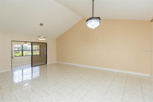 2211 Bay Berry Ln, Clearwater, FL 33763 - spare room featuring vaulted ceiling, light tile patterned floors, baseboards, and ceiling fan