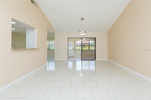 2211 Bay Berry Ln, Clearwater, FL 33763 - spare room featuring baseboards