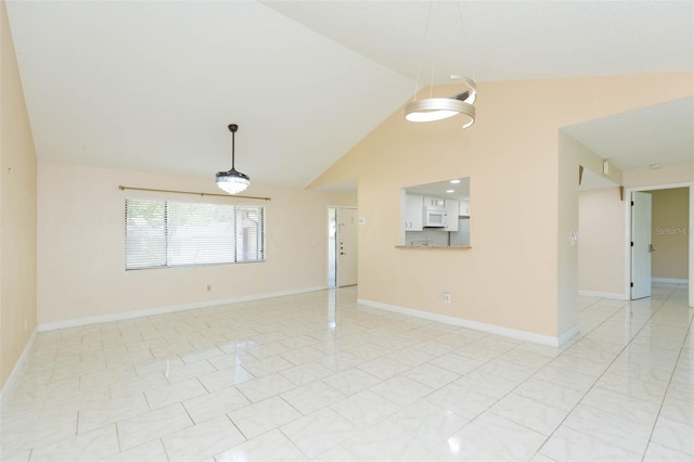 2211 Bay Berry Ln, Clearwater, FL 33763 - unfurnished living room with lofted ceiling and baseboards