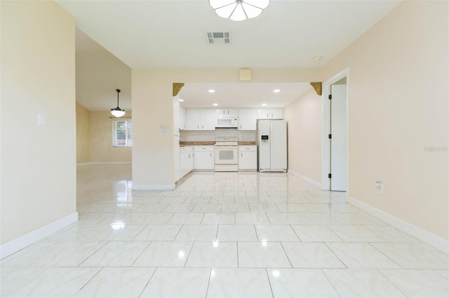 2211 Bay Berry Ln, Clearwater, FL 33763 - unfurnished living room featuring recessed lighting, baseboards, and light tile patterned floors