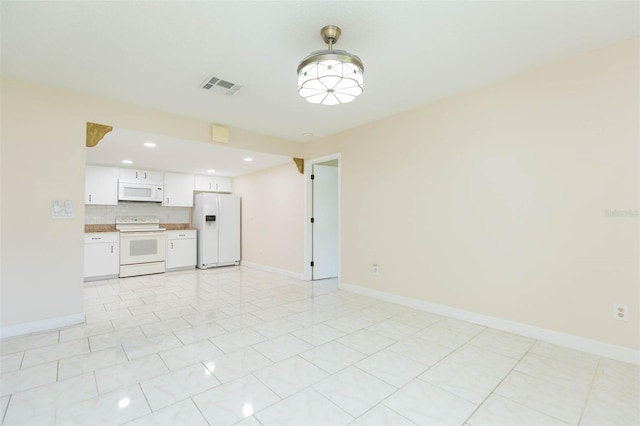 2211 Bay Berry Ln, Clearwater, FL 33763 - unfurnished living room with baseboards, recessed lighting, and light tile patterned floors