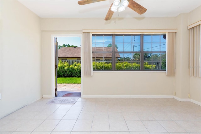 2211 Bay Berry Ln, Clearwater, FL 33763 - empty room with light tile patterned floors and a ceiling fan