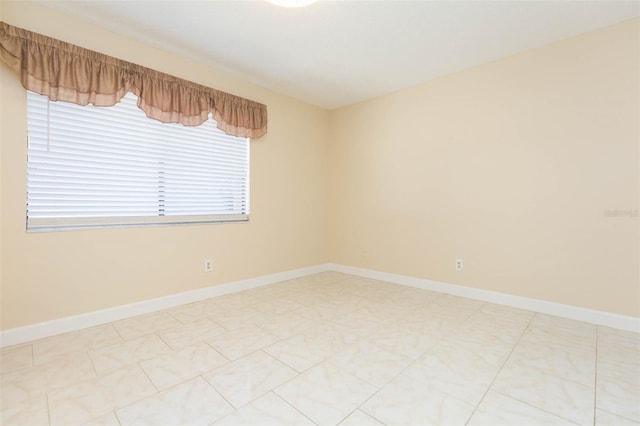 2211 Bay Berry Ln, Clearwater, FL 33763 - spare room featuring baseboards