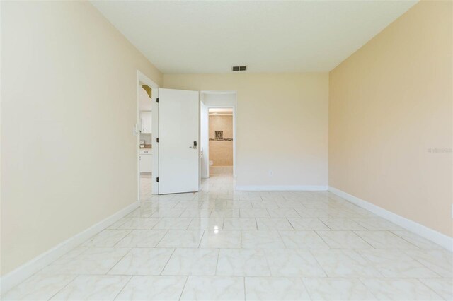 2211 Bay Berry Ln, Clearwater, FL 33763 - spare room featuring baseboards