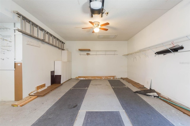 2211 Bay Berry Ln, Clearwater, FL 33763 - garage featuring a ceiling fan