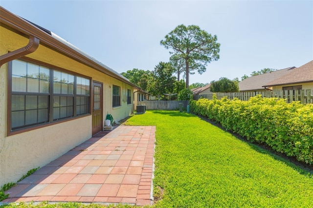 2211 Bay Berry Ln, Clearwater, FL 33763 - view of yard with central air condition unit and a patio