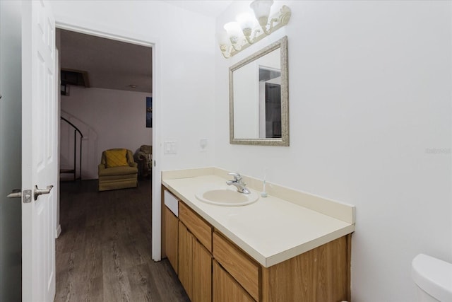 1010 Oakhill St, Seffner, FL 33584 - bathroom featuring wood finished floors, vanity, and toilet