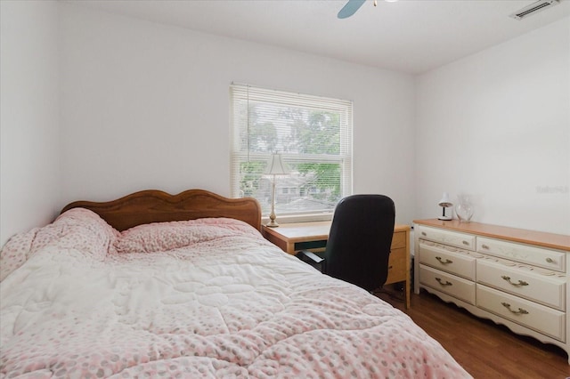 1010 Oakhill St, Seffner, FL 33584 - bedroom with dark wood finished floors and a ceiling fan