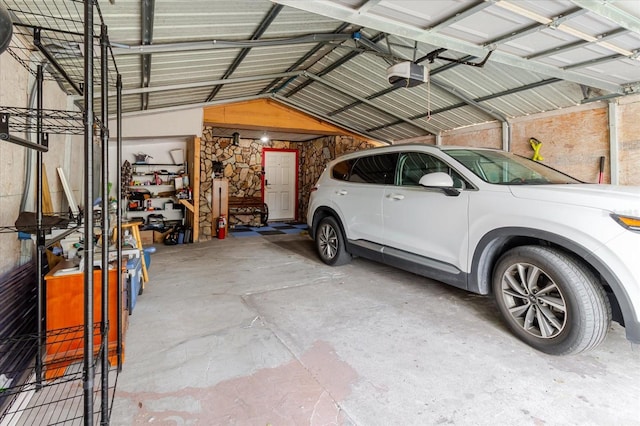 1010 Oakhill St, Seffner, FL 33584 - garage featuring a garage door opener