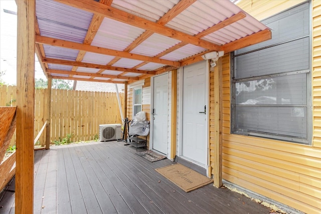 1010 Oakhill St, Seffner, FL 33584 - wooden terrace with fence and a cooling unit