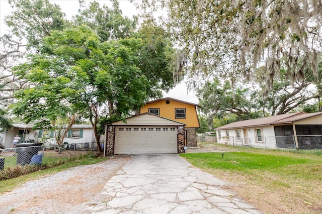1010 Oakhill St, Seffner, FL 33584 - view of front of property with stone siding and driveway