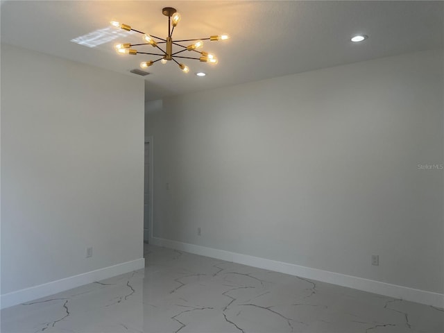 4241 E Palifox St, Tampa, FL 33610 - spare room featuring a chandelier, light marble finish flooring, and recessed lighting