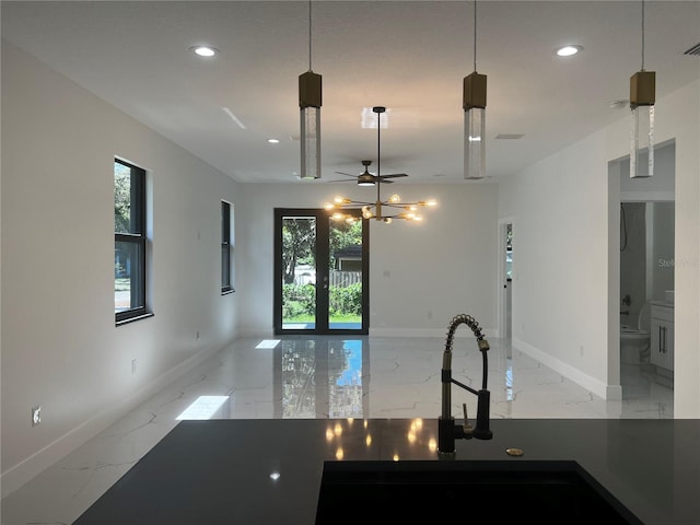 4241 E Palifox St, Tampa, FL 33610 - kitchen with marble tiled flooring, recessed lighting, open floor plan, and a ceiling fan