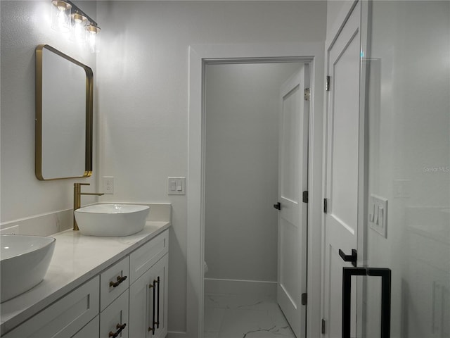 4241 E Palifox St, Tampa, FL 33610 - full bath with marble look tiles and double vanity