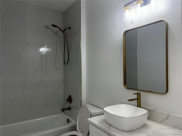 4241 E Palifox St, Tampa, FL 33610 - bathroom featuring vanity, bathtub / shower combination, and marble look tile flooring