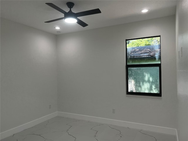 4241 E Palifox St, Tampa, FL 33610 - spare room featuring light marble finish flooring, recessed lighting, and a ceiling fan