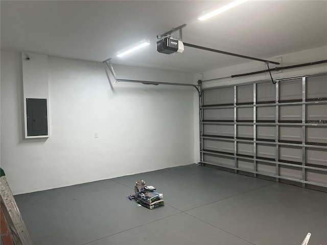 4241 E Palifox St, Tampa, FL 33610 - garage with electric panel and a garage door opener