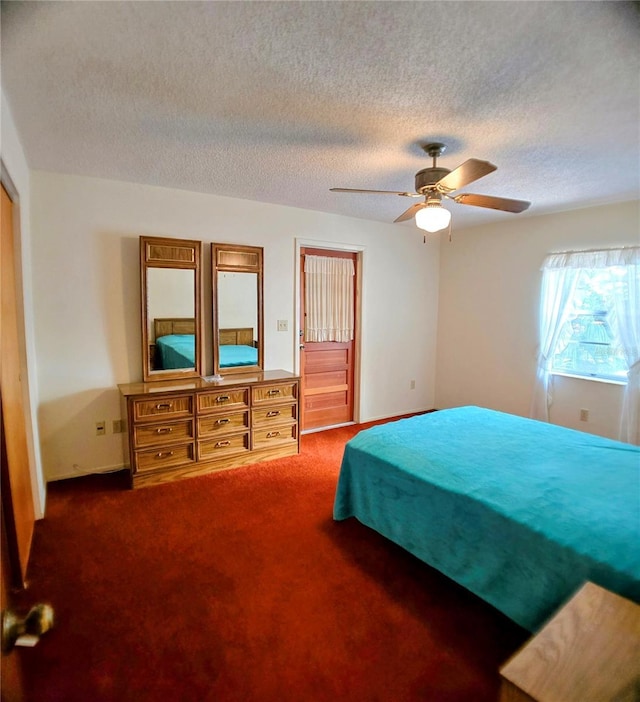 1262 Jeffords St, Clearwater, FL 33756 - bedroom featuring carpet flooring, a textured ceiling, ceiling fan, and a closet