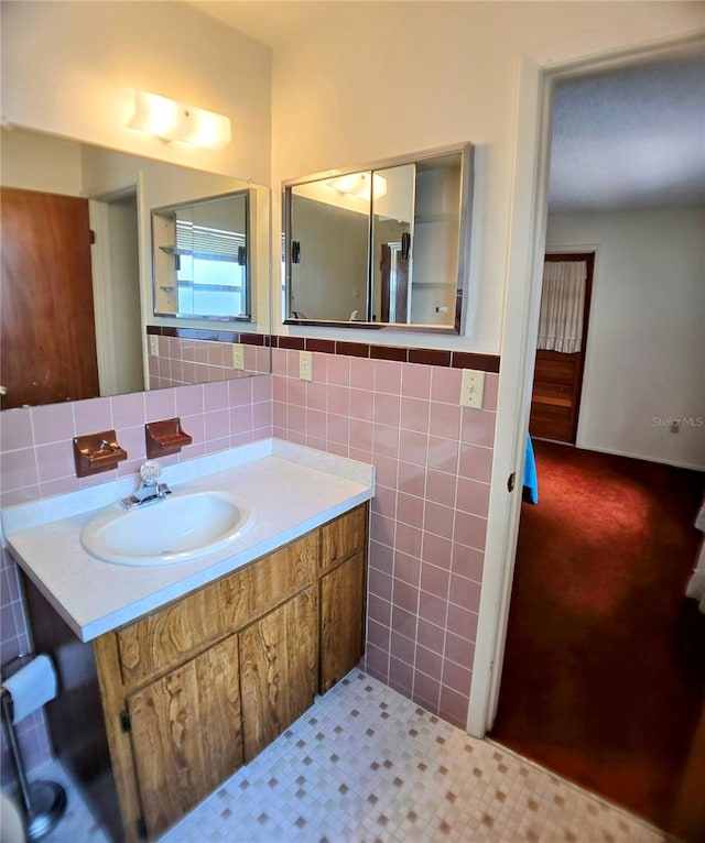 1262 Jeffords St, Clearwater, FL 33756 - bathroom featuring tile walls and vanity