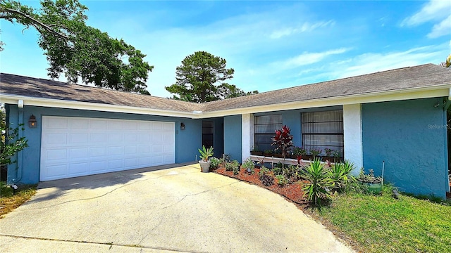 3907 Orchard Hill Cir, Palm Harbor, FL 34684 - ranch-style house with stucco siding, driveway, and an attached garage