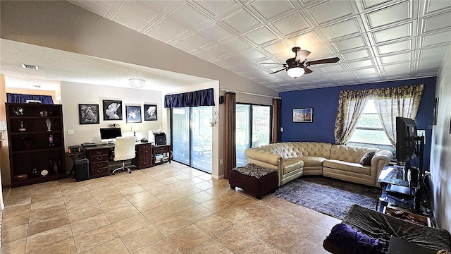 3907 Orchard Hill Cir, Palm Harbor, FL 34684 - living room with an office area, ceiling fan, an ornate ceiling, and light tile patterned flooring