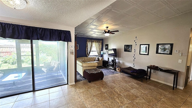 3907 Orchard Hill Cir, Palm Harbor, FL 34684 - living area featuring baseboards, a ceiling fan, and an ornate ceiling