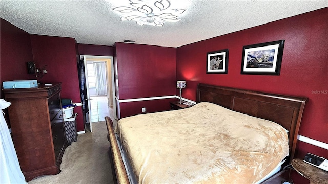 3907 Orchard Hill Cir, Palm Harbor, FL 34684 - carpeted bedroom with a textured ceiling