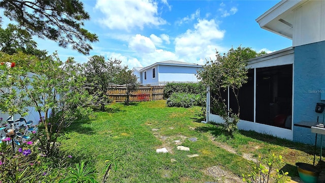 3907 Orchard Hill Cir, Palm Harbor, FL 34684 - view of yard featuring a sunroom