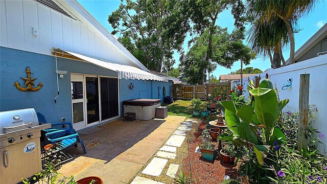 3907 Orchard Hill Cir, Palm Harbor, FL 34684 - view of patio / terrace featuring area for grilling and a fenced backyard