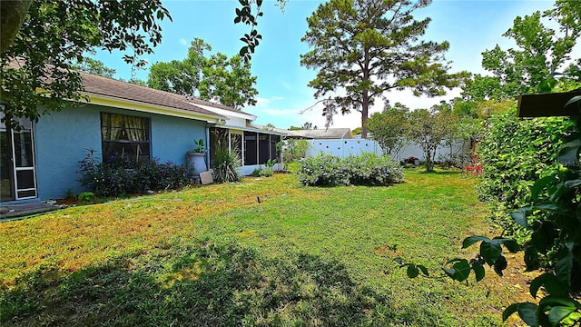 3907 Orchard Hill Cir, Palm Harbor, FL 34684 - view of yard with a sunroom