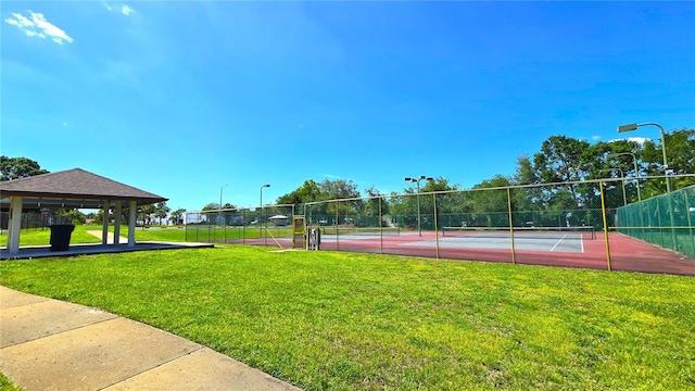 3907 Orchard Hill Cir, Palm Harbor, FL 34684 - view of tennis court with a gazebo