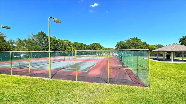 3907 Orchard Hill Cir, Palm Harbor, FL 34684 - view of tennis court with a gazebo