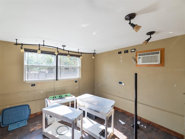 6726 Udell Ln, Hudson, FL 34667 - miscellaneous room with a wall mounted AC and baseboards