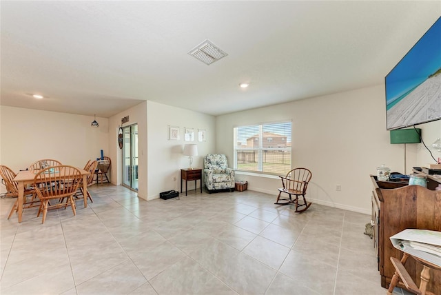 10732 Chippewa Dr, Parrish, FL 34219 - living area featuring light tile patterned flooring, french doors, recessed lighting, and baseboards