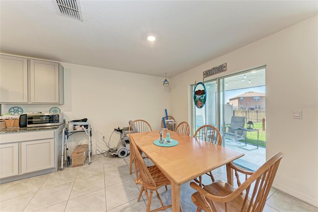 10732 Chippewa Dr, Parrish, FL 34219 - dining room with light tile patterned floors