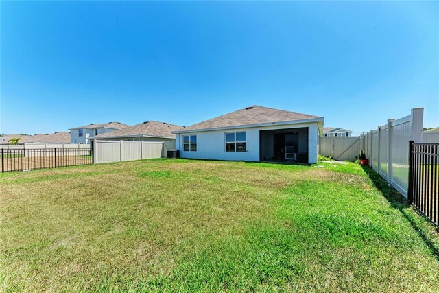 10732 Chippewa Dr, Parrish, FL 34219 - rear view of house featuring stucco siding