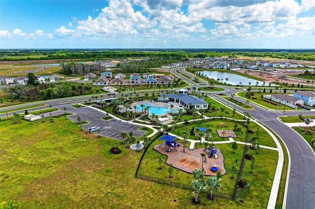 10732 Chippewa Dr, Parrish, FL 34219 - aerial view of property's location with a pool area, a nearby body of water, and nearby suburban area