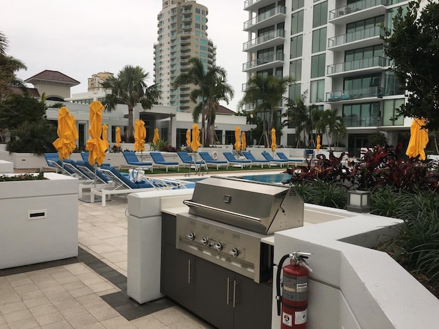 view of patio with a grill
