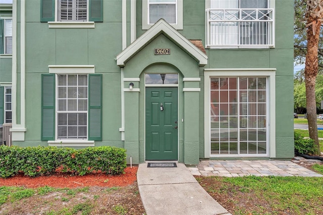 9602 Lake Chase Island Way Unit 9602, Tampa, FL 33626 - entrance to property featuring stucco siding