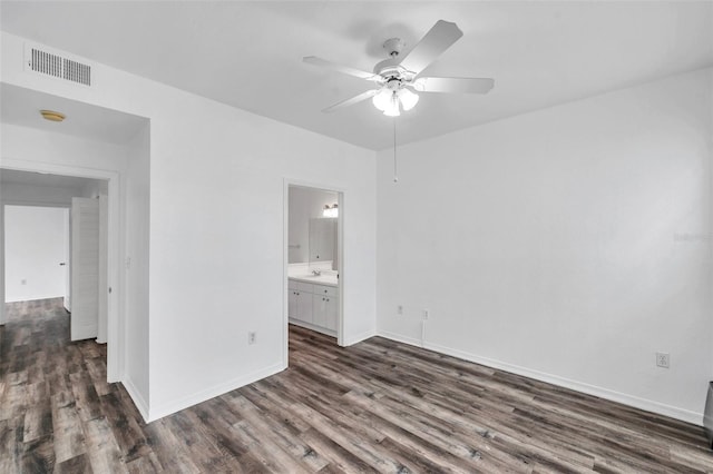 9602 Lake Chase Island Way Unit 9602, Tampa, FL 33626 - unfurnished room featuring dark wood finished floors, a ceiling fan, baseboards, and a smoke detector