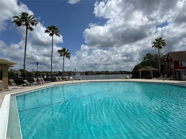 9602 Lake Chase Island Way Unit 9602, Tampa, FL 33626 - community pool with a gazebo and a patio area