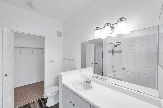 9602 Lake Chase Island Way Unit 9602, Tampa, FL 33626 - full bath featuring vanity, bathing tub / shower combination, wood finished floors, and a spacious closet