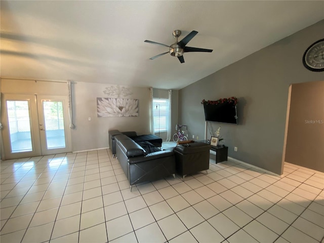 12912 Leadwood Dr, Riverview, FL 33579 - living room with a ceiling fan, light tile patterned floors, healthy amount of natural light, vaulted ceiling, and french doors