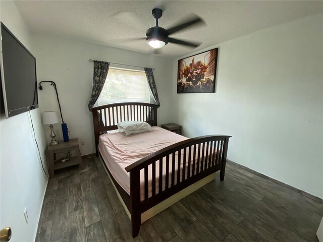 12912 Leadwood Dr, Riverview, FL 33579 - bedroom with wood finished floors, a textured ceiling, and a ceiling fan